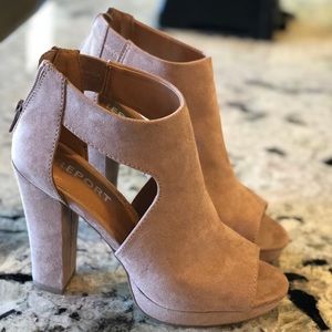 Report tan chunky heels.
